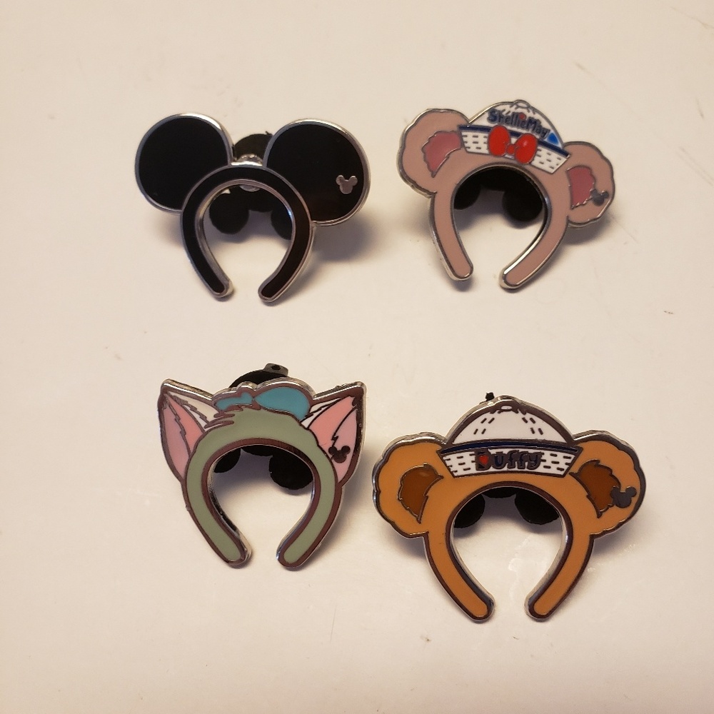 Midden mickey pins